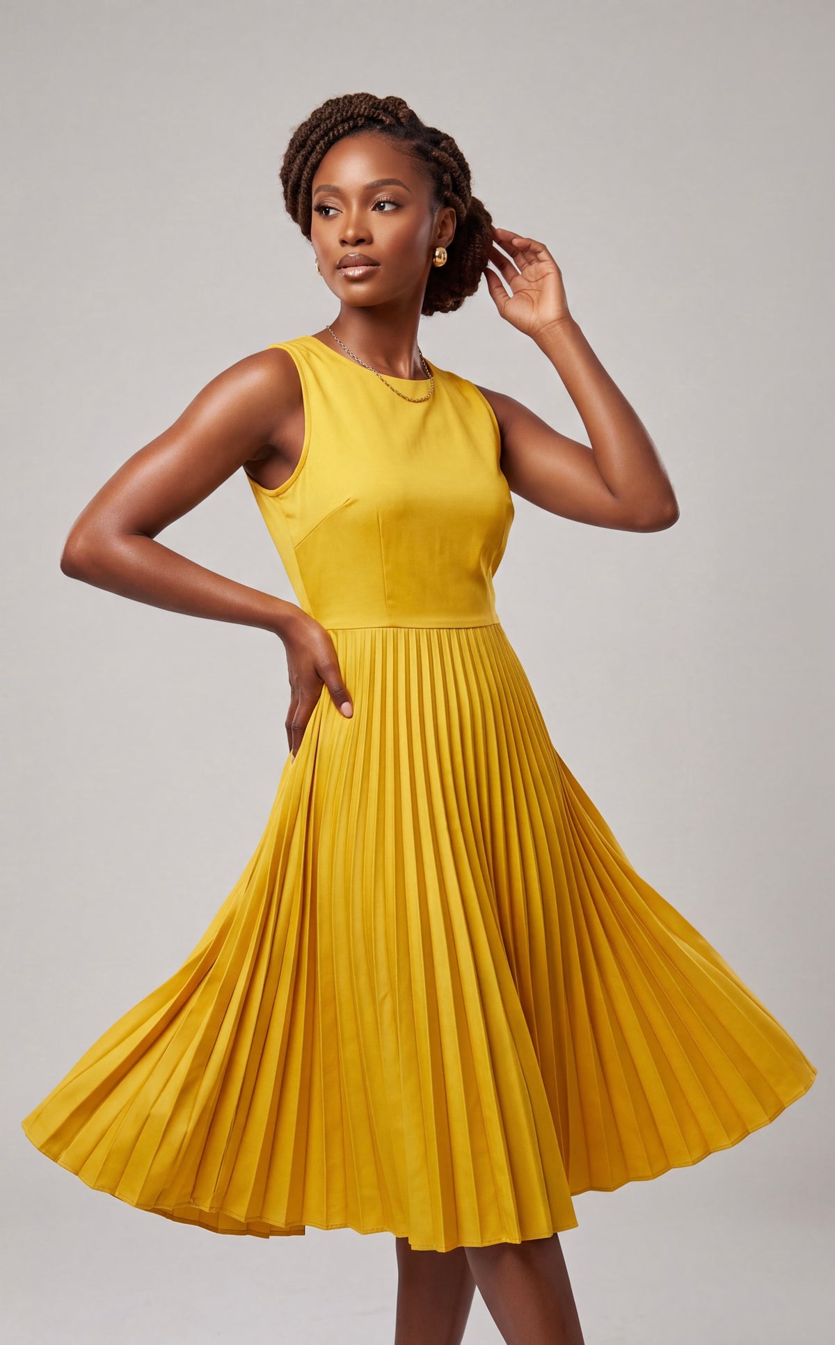 Yellow pleated dress